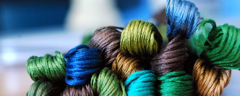 Very light red embroidery floss