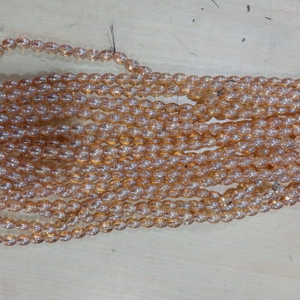 RICE SHAPED GLASS BEADS, GOLDEN SHADOW AB 10MM